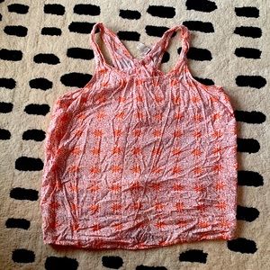 Orange, open-back shirt